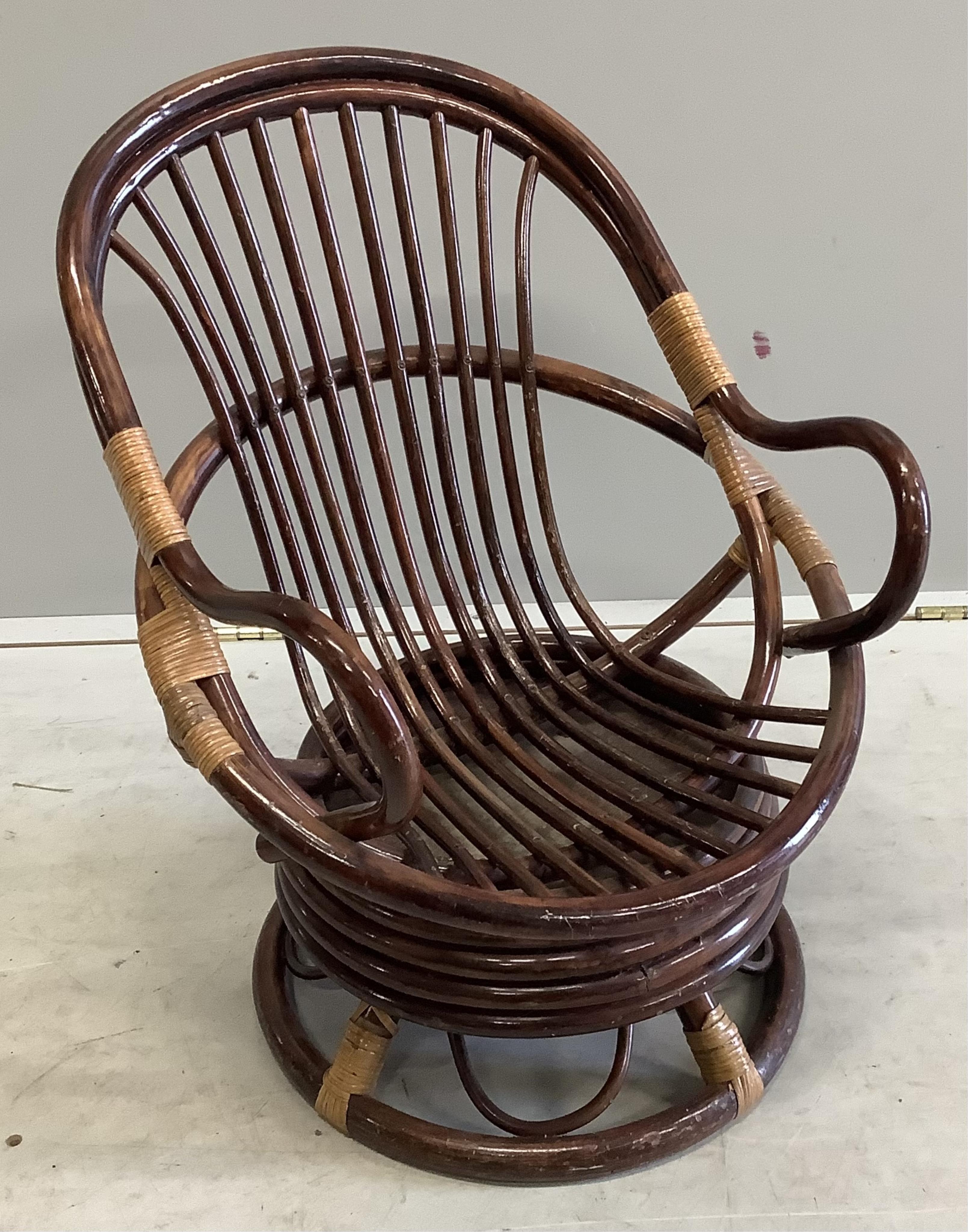 A pair of beech child's chairs together with a bamboo swivel child's chair, largest width 45cm, height 56cm. Condition - fair